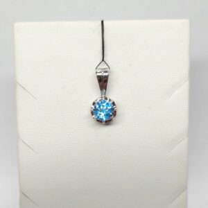 Wisiorek z białego złota z topazem błękitnym, złoto pr. 0,750