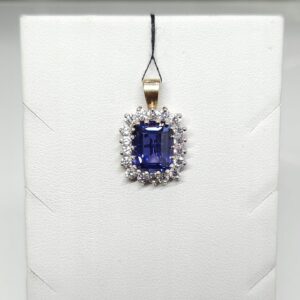 Złoty wisiorek z fioletowym kamieniem i cyrkoniami, złoto pr. 0,375